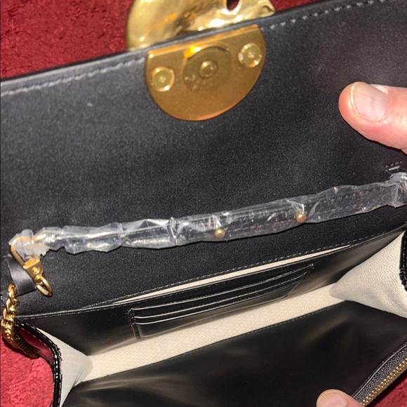 Elegant Black and Gold Clutch with Chain by Ted Baker - Picture 8 of 10